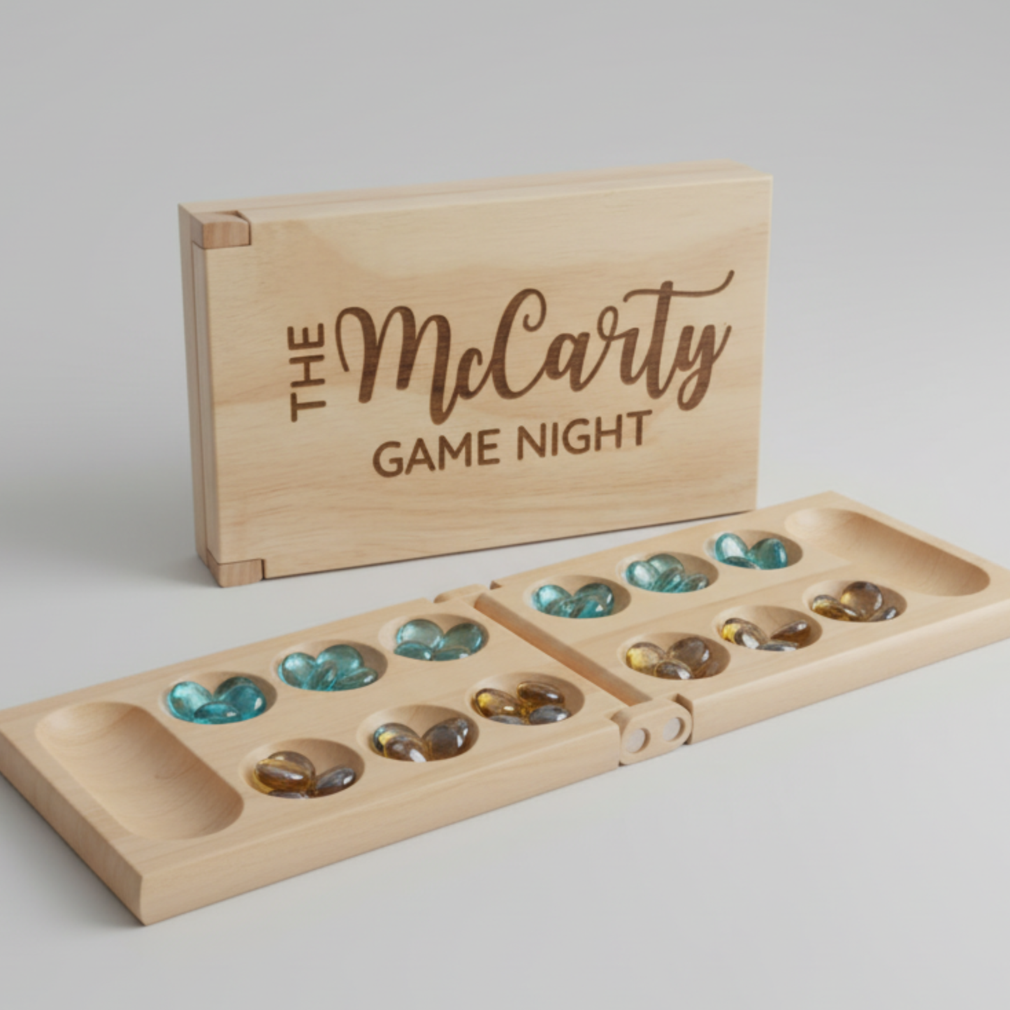 Personalized folding wood mancala game set with blue and brown sowing stones, travel ready board, family game night keepsake by Scratch That Etch